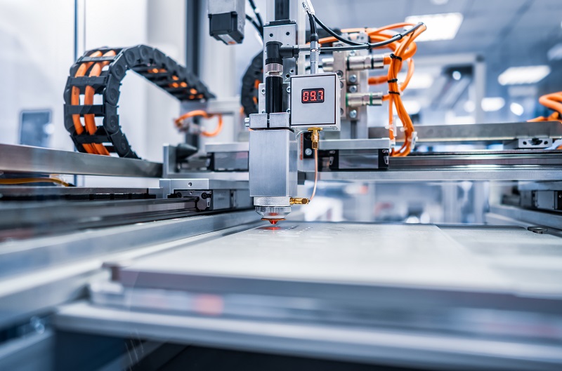 CNC Laser cutting of metal, modern industrial technology.